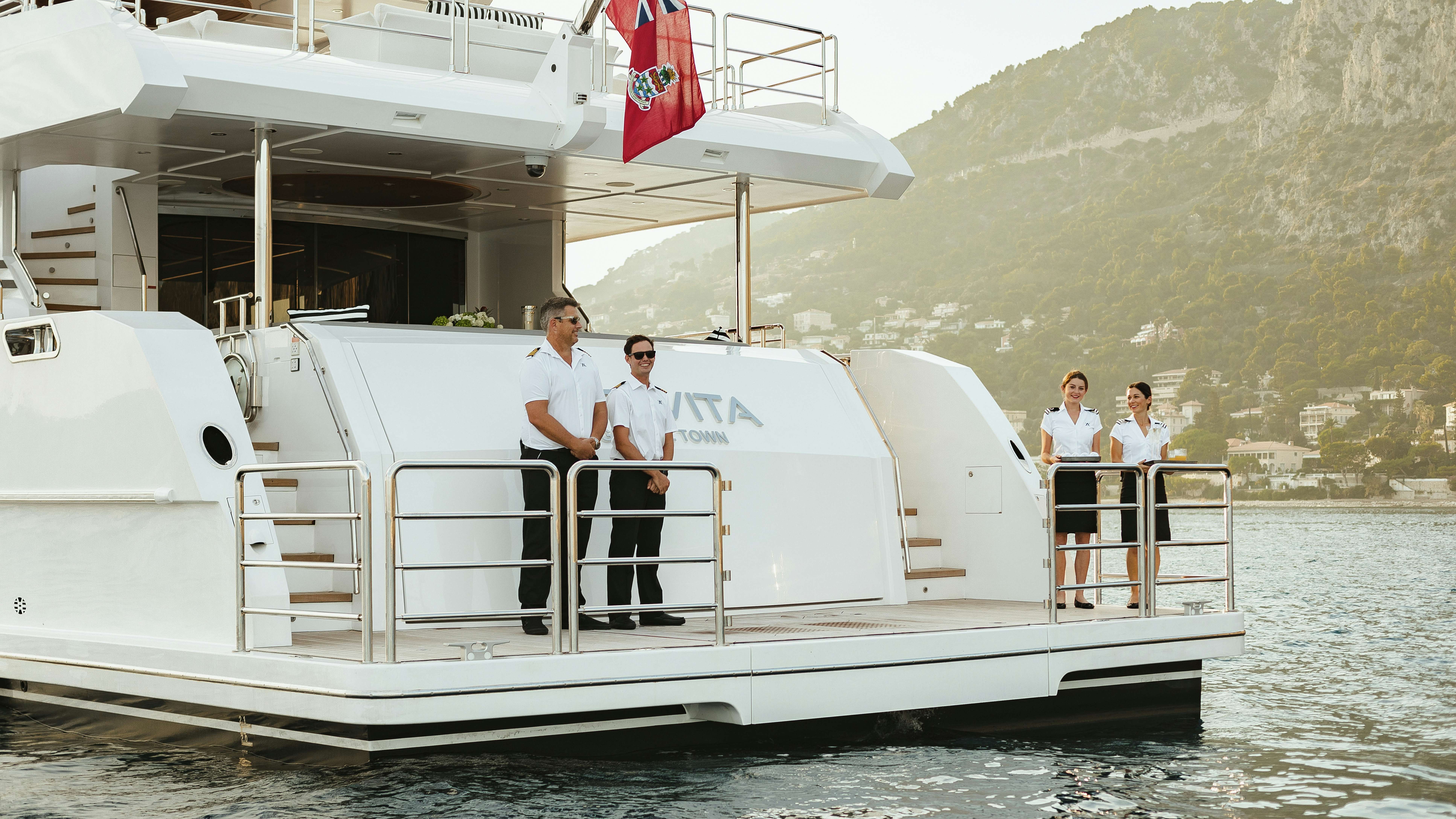 126' (40.89m) Gulf Craft ALTAVITA yacht crew awaiting guests on the swim platform