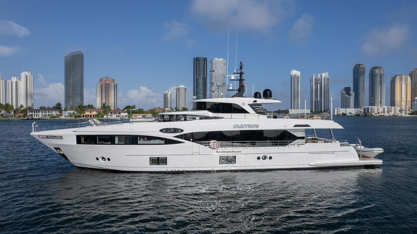 a white yacht in the water aboard SANTOSH Yacht for Charter