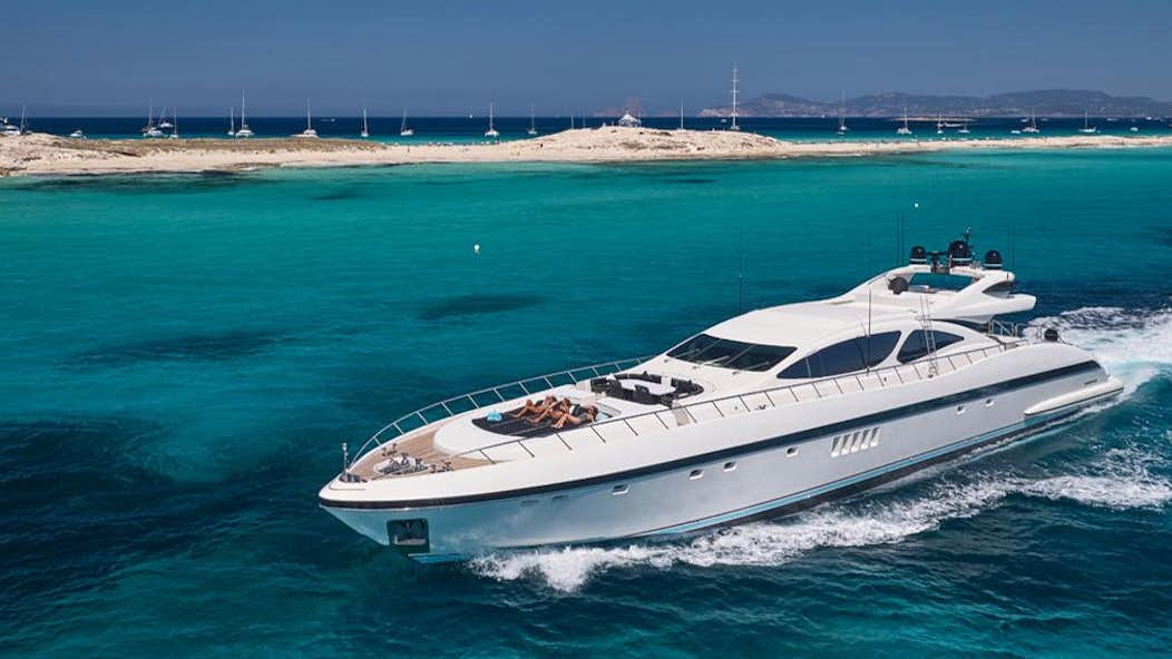 a white yacht on the water aboard MRS GREY Yacht for Charter