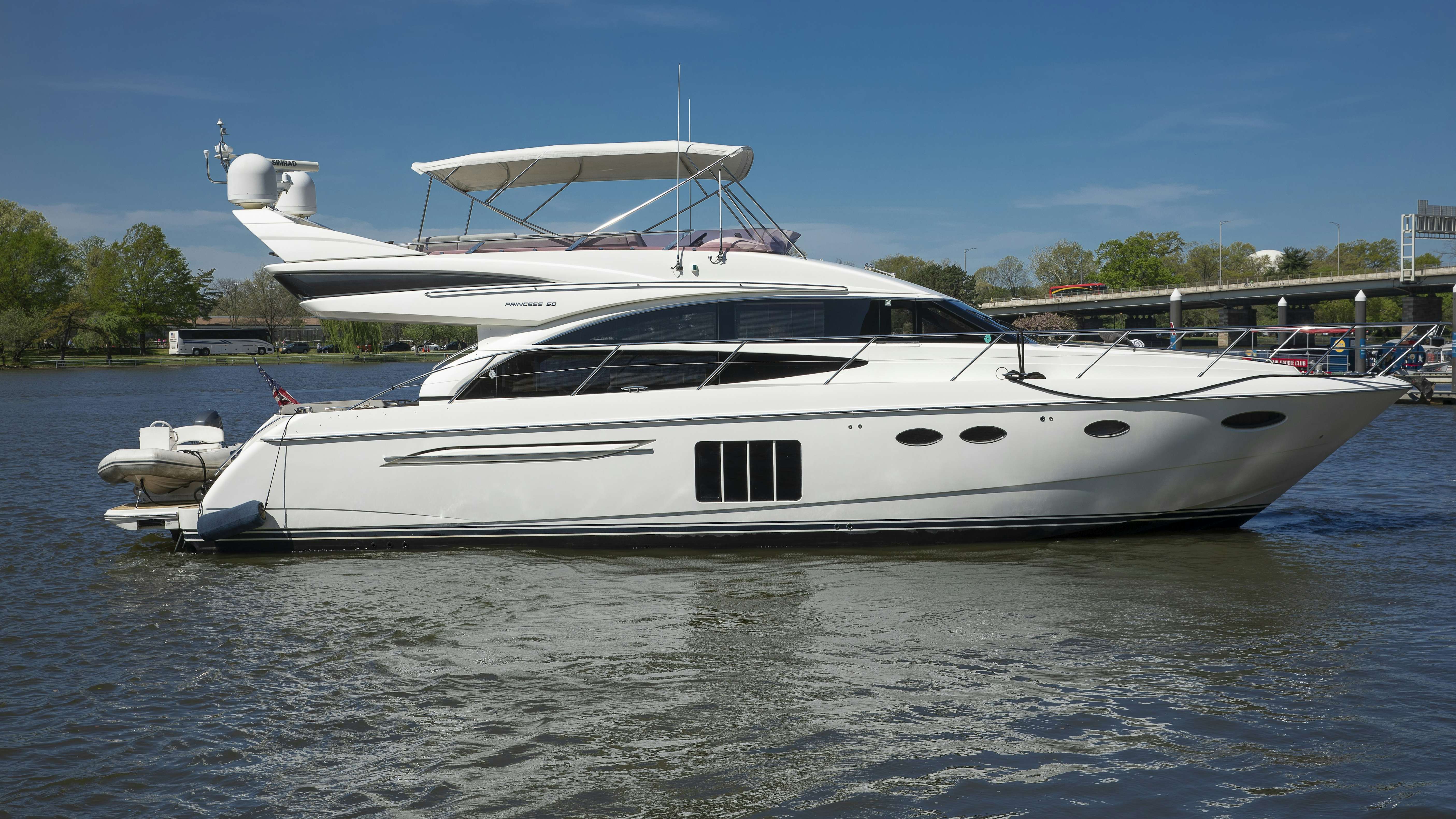 a white yacht in the water aboard PHASE ONE Yacht for Sale