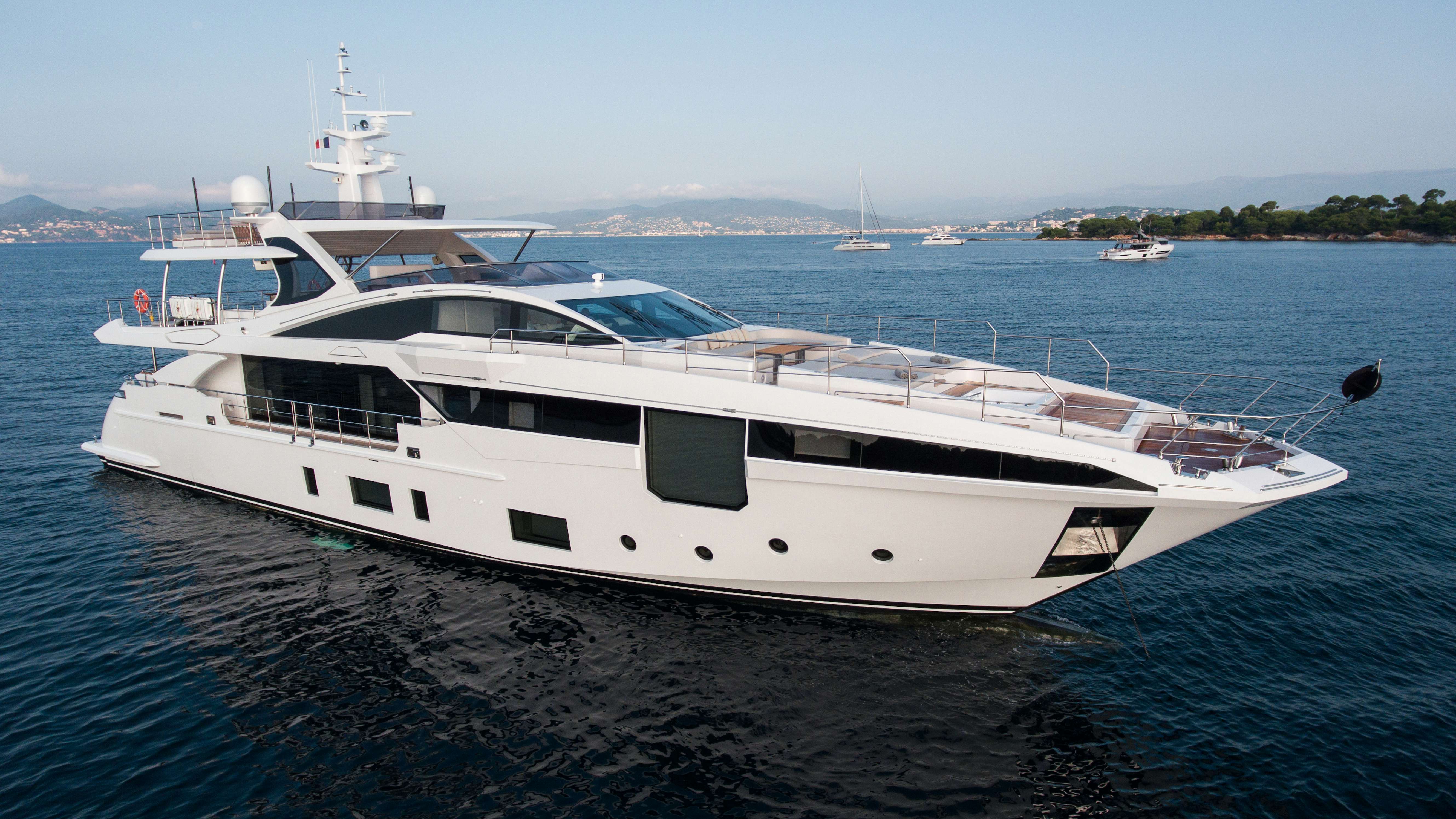 a white yacht in the water aboard HEED Yacht for Sale