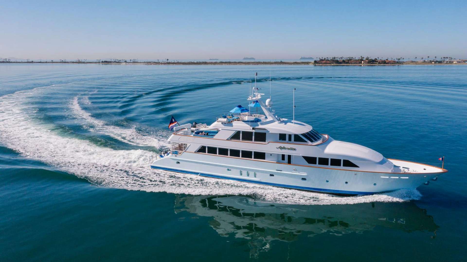 a white boat on the water aboard APHRODITE Yacht for Sale