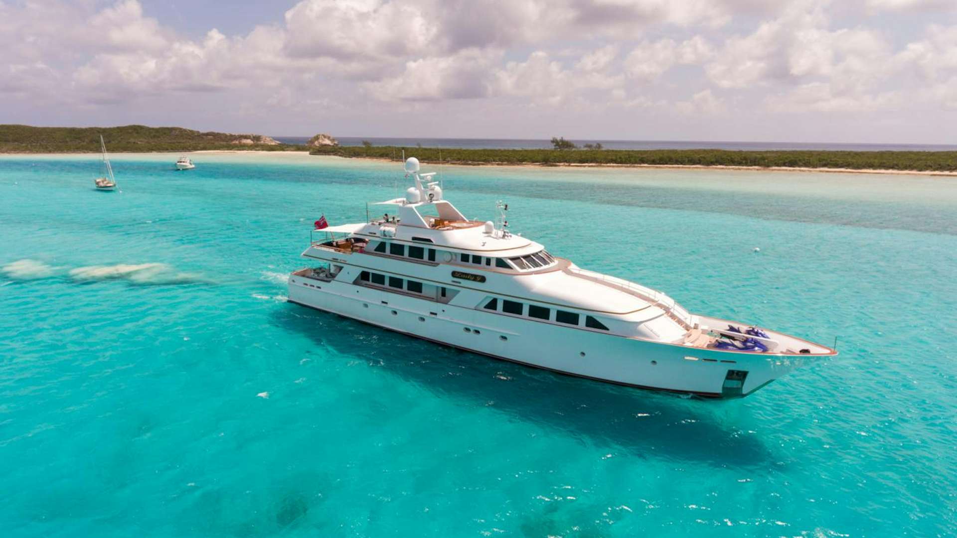 a white boat in the water aboard LADY J Yacht for Sale