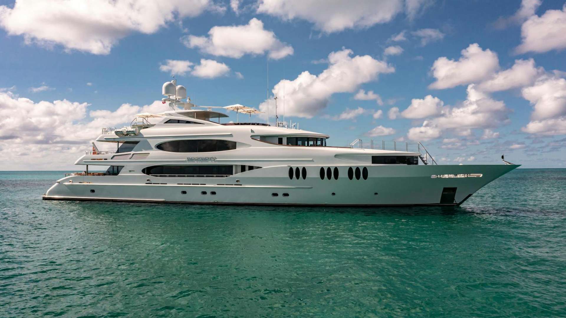 a white yacht in the water aboard IMPROMPTU Yacht for Sale