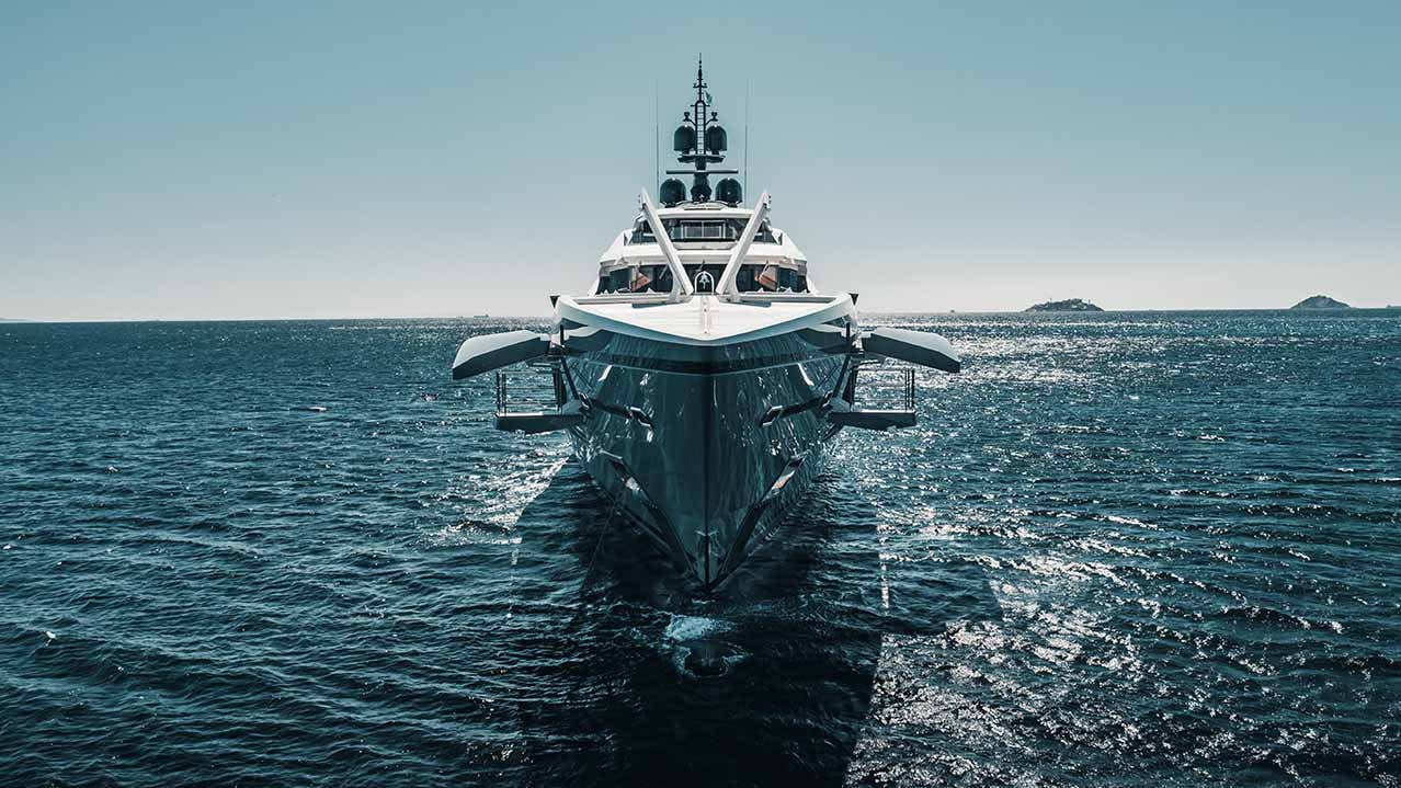 Front view of a yacht with side balconies extended