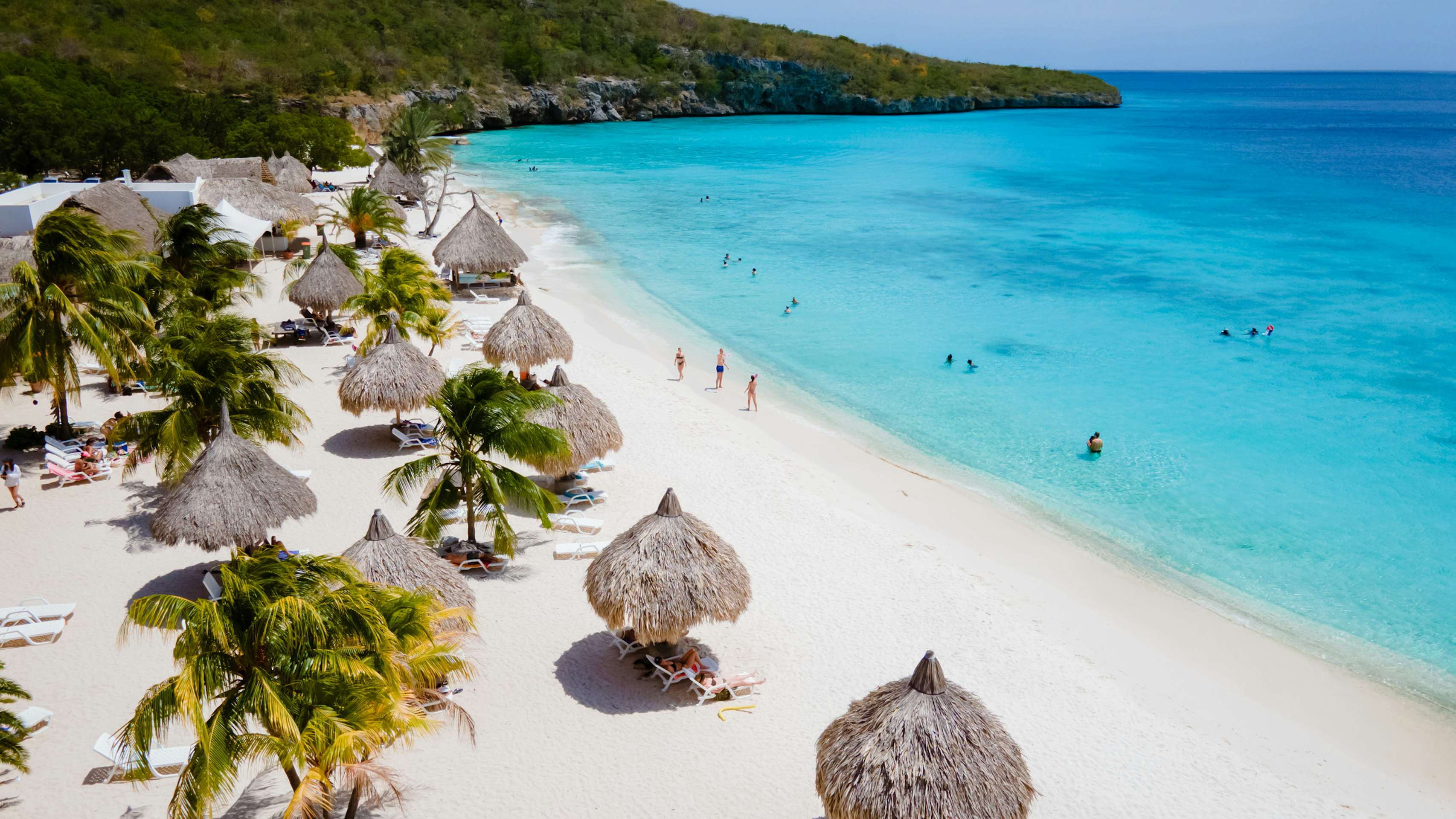 ABC Islands Yacht Charter - Cas Abou Beach on the caribbean island of Curacao, Playa Cas Abou in Curacao Caribbean tropical white beach with blue ocean