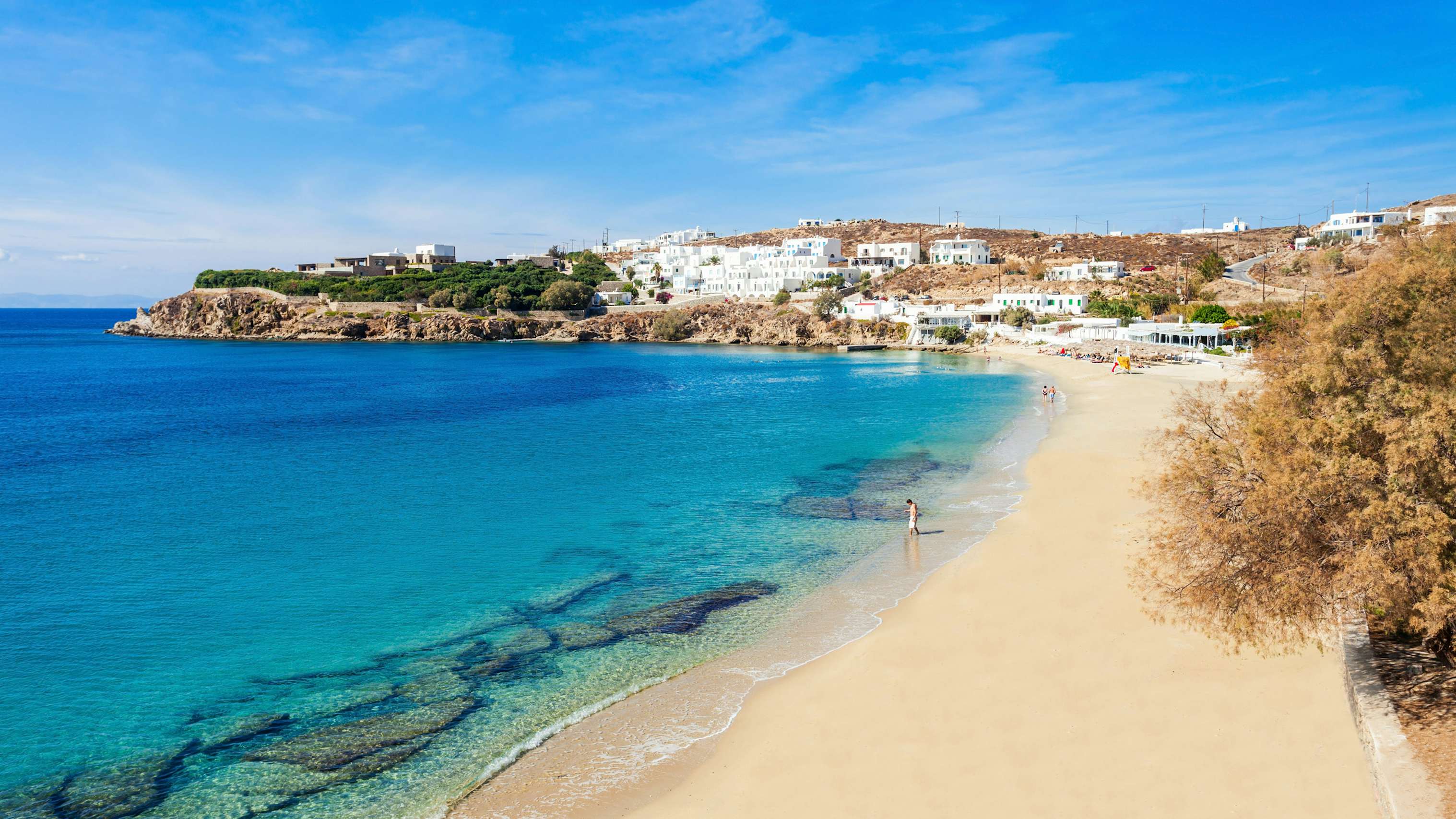 The serene shores of the Dodecanese islands with clear waters and sandy beaches, inviting a peaceful yacht anchorage.