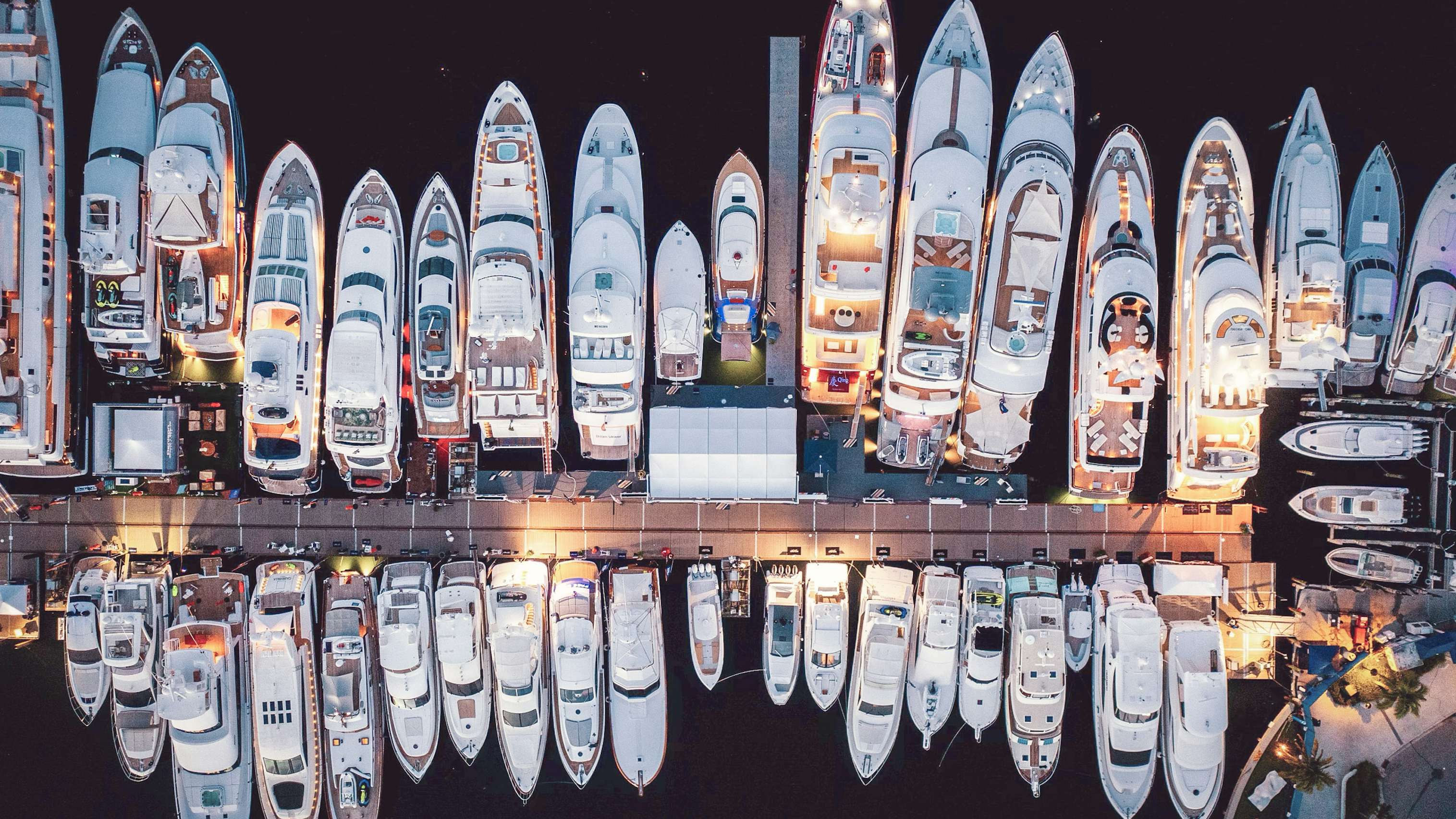 Aerial view of fleet of yachts docked together during a yacht show