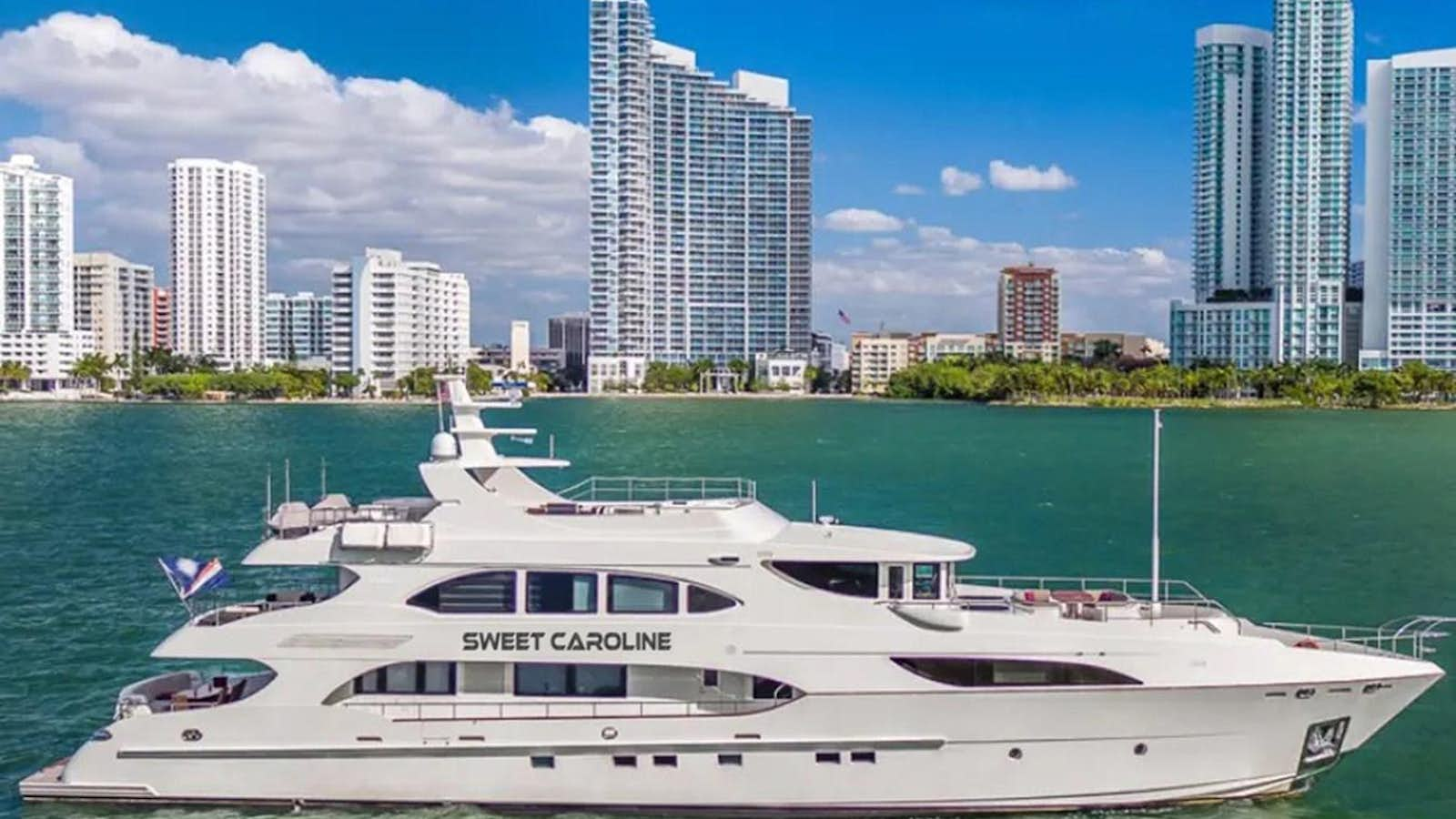 a white yacht in the water aboard SWEET CAROLINE Yacht for Sale