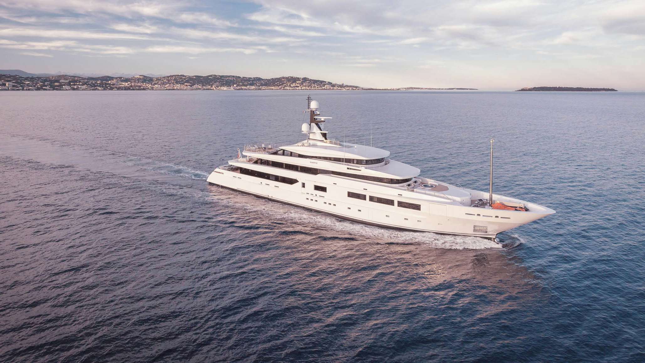 Side view of a superyacht cruising in blue sea | Yacht for Sale |N&J